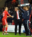 Joe Cole shakes hands with Roy Hodgson