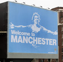 Manchester City display an image of Carlos Tevez