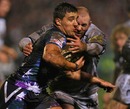 Ospreys' Rhys Webb is tackled by Leicester's Rob Hawkins