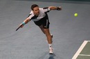 Robin Soderling dives to reach a forehand