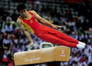 Haibin Teng works through his routine on the Pommel Horse 