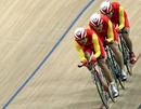  Xiao Jiang, Chuanmin Li, and Jie Wang compete in the Men's Team Pursuit 