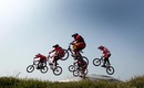 Cyclists compete in the men's BMX final