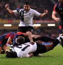 Fiji's Albert Vulivuli touches down for a try