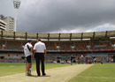 Andrew Strauss inspects the Gabba pitch
