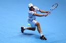 Andy Roddick goes down on his knee