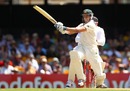 Mike Hussey pulls hard against the spin