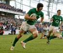Ireland's Stephen Ferris coasts in for a try