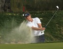 Luke Donald plays from a bunker