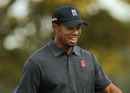 Tiger Woods chuckles to himself