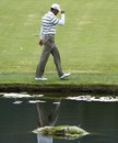 Tiger Woods strolls to the next hole