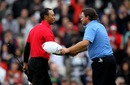 Tiger Woods congratulates Graeme McDowell