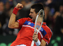Novak Djokovic celebrates his singles win
