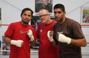 Amir Khan, Freddie Roach and Manny Pacquiao pose for the cameras