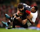 George North is sent crashing to the turf