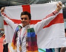 Tom Daley shows off his gold medal