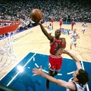 Michael Jordan attempts a layup against the Utah Jazz