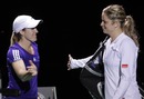 Justine Henin congratulates Kim Clijsters