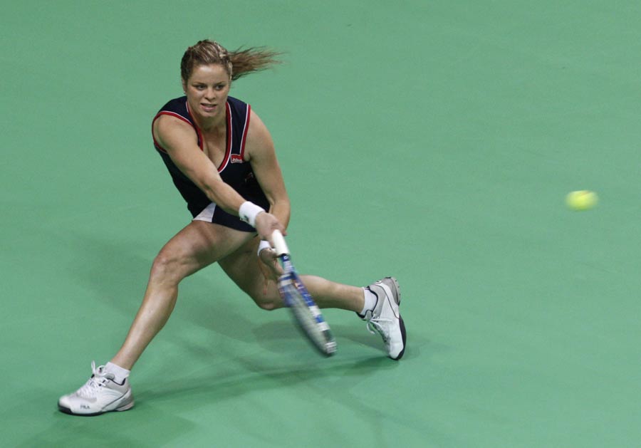 Kim Clijsters hits a backhand