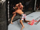 Josh Koscheck attempts to take Georges St-Pierre to the mat
