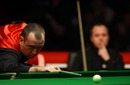 John Higgins watches on as Mark Williams plays