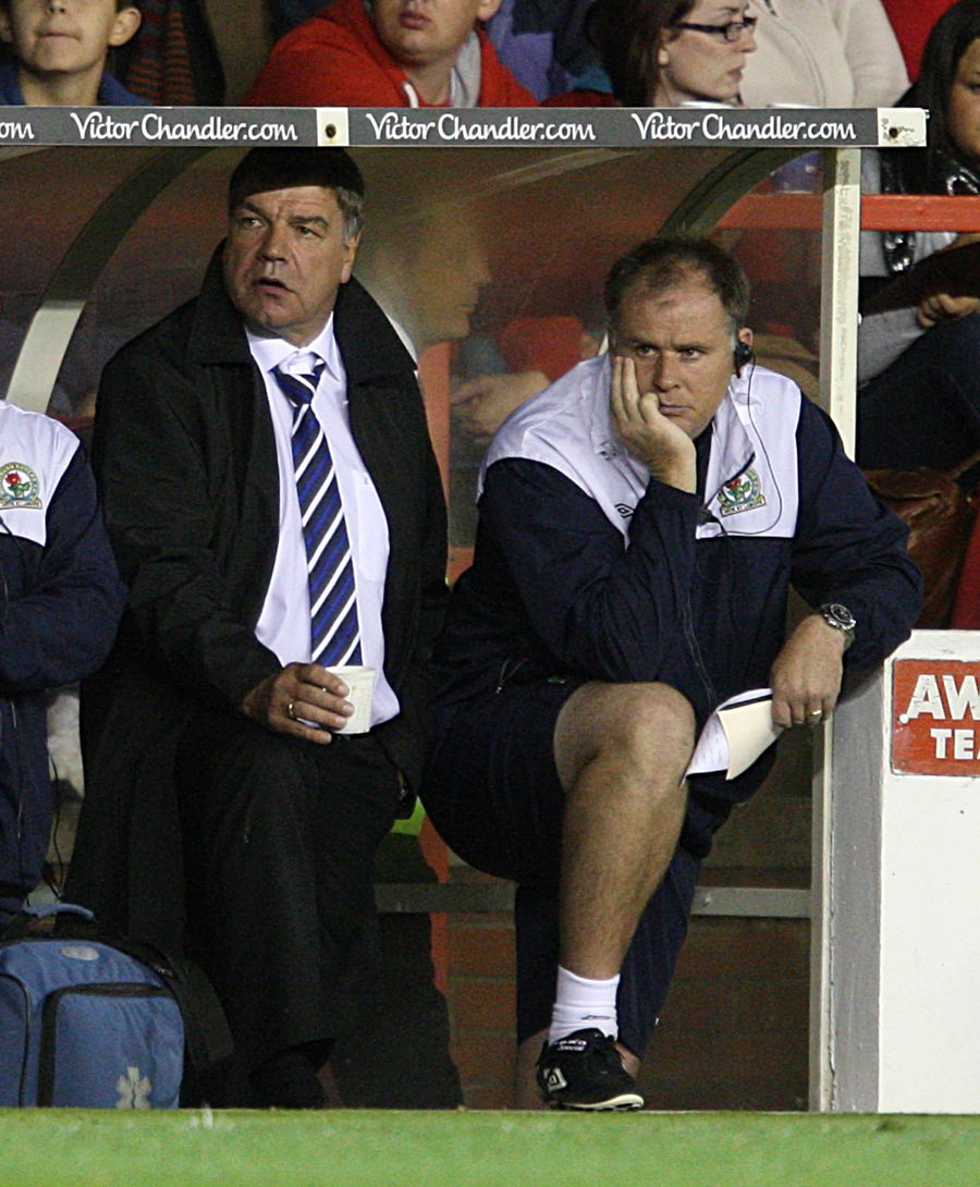 Sam Allardyce and Steve Kean watch the action from the dugout