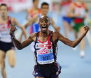 Mo Farah celebrates his win in the 10,000 metres