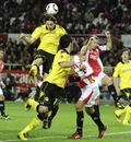 Neven Subotic heads a goal for Dortmund