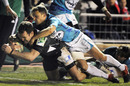 London Irish's Chris Malone forces his way over the line
