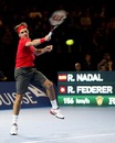 Roger Federer returns to Rafael Nadal