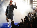 Roger Federer waves to spectators as he arrives to play against Rafael Nadal