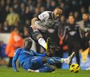 Younes Kaboul challenges Cheik Tiote 