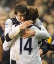 Gareth Bale and Luke Modric celebrate victory over Newcastle