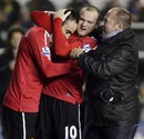 Dimitar Berbatov celebrates with Wayne Rooney