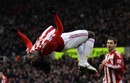 Kenwyne Jones celebrates acrobatically after scoring