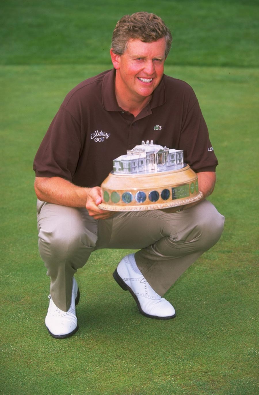 Colin Montgomerie poses with his trophy