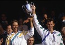 Jo Durie and Jeremy Bates lift the mixed doubles trophy