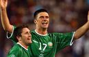 Robbie Keane celebrates with Niall Quinn