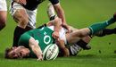 Tommy Bowe is held up by tacklers