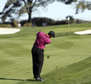 Tiger Woods hits his second shot on the 13th hole at Torrey Pines 
