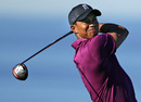 Tiger Woods watches his tee shot with interest