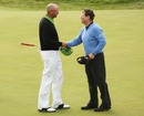 Stewart Cink is congratulated by Tom Watson (R) of after winning the 138th Open Championship