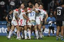 The England team celebrate the try of Peter Fox during the Gillette Four Nations match against New Zealand
