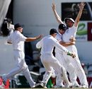 Andrew Flintoff celebrates after running out Ricky Ponting