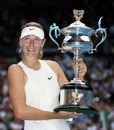 Maria Sharapova holds aloft the trophy after beating Ana Ivanovic in the final of the 2008 Australian Open