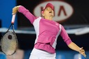 Vera Zvonareva hits an overhead against Victoria Azarenka