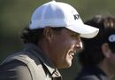 Phil Mickelson cracks a grin