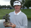 Bubba Watson poses with his trophy