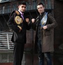 Paul McCloskey and Amir Khan pose with their light-welterweight belts