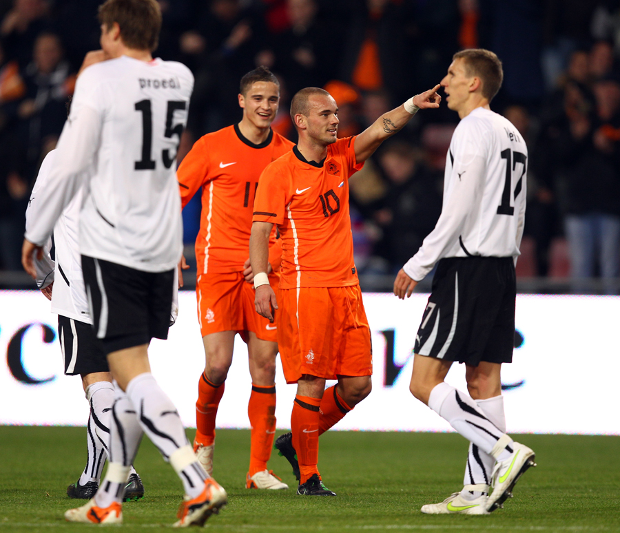 Wesley Sneijder celebrates Holland's opening goal against Austria